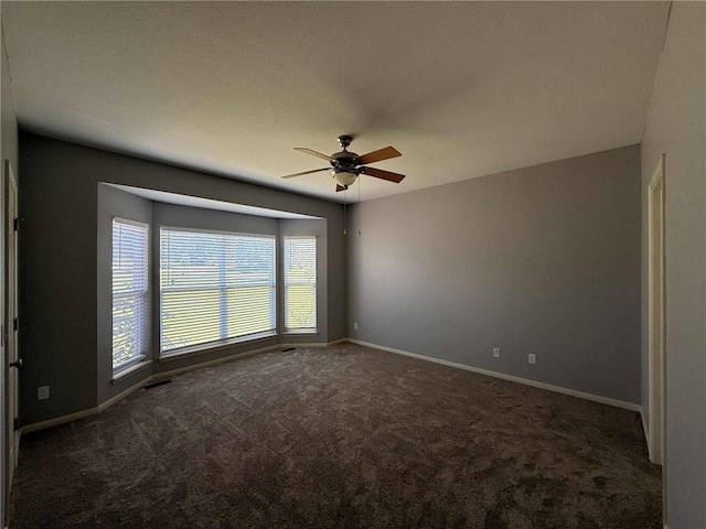 8808 NE 97th St, Kansas City, MO 64157 - unfurnished room with ceiling fan and carpet flooring
