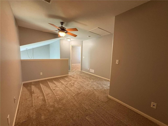 8808 NE 97th St, Kansas City, MO 64157 - spare room with carpet flooring, ceiling fan, attic access, and vaulted ceiling