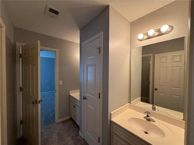 8808 NE 97th St, Kansas City, MO 64157 - bathroom featuring vanity and baseboards