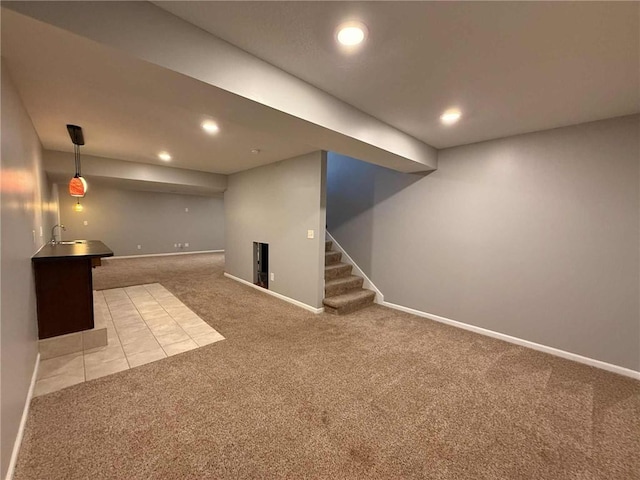 8808 NE 97th St, Kansas City, MO 64157 - finished below grade area with light carpet, recessed lighting, and stairway