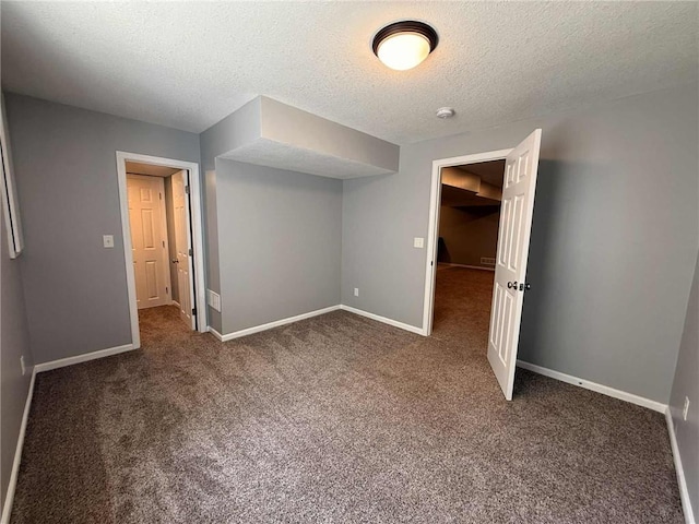 8808 NE 97th St, Kansas City, MO 64157 - carpeted spare room featuring a textured ceiling and a smoke detector