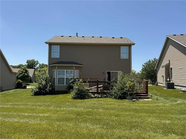 8808 NE 97th St, Kansas City, MO 64157 - back of house with a deck and a lawn