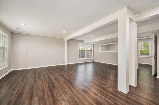 109 NE Locust St, Blue Springs, MO 64014 - unfurnished living room featuring wood finished floors, plenty of natural light, crown molding, and recessed lighting