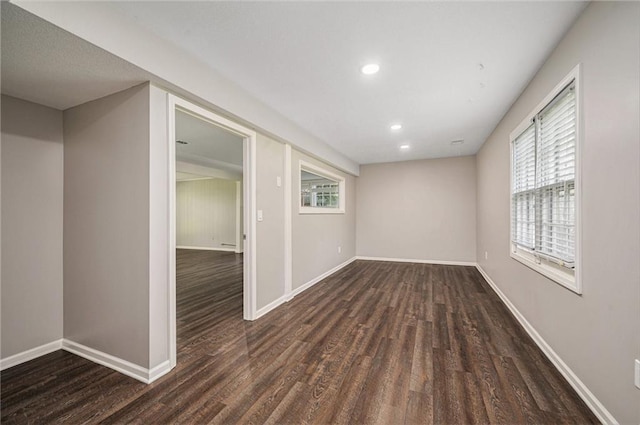 109 NE Locust St, Blue Springs, MO 64014 - spare room featuring wood finished floors, plenty of natural light, and recessed lighting