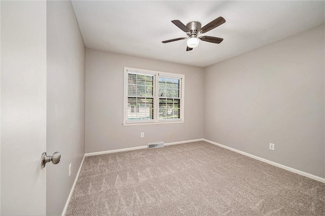 109 NE Locust St, Blue Springs, MO 64014 - carpeted spare room featuring baseboards and ceiling fan