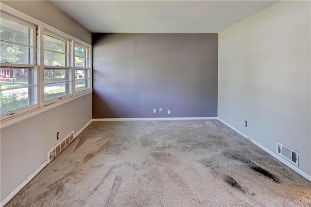 1700 S Pearl St, Independence, MO 64055 - spare room featuring carpet flooring