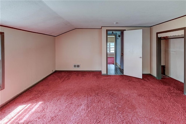 1700 S Pearl St, Independence, MO 64055 - additional living space featuring carpet floors and vaulted ceiling