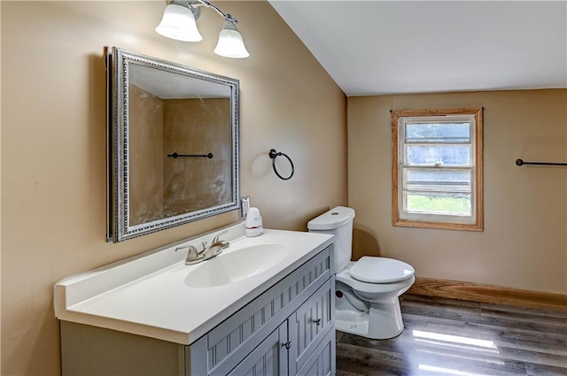 1700 S Pearl St, Independence, MO 64055 - bathroom featuring vanity and wood finished floors