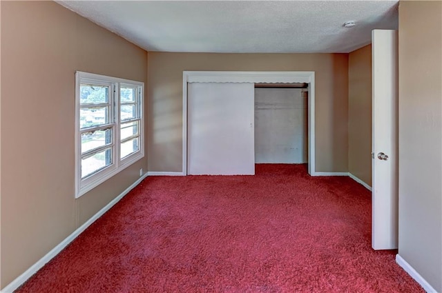 1700 S Pearl St, Independence, MO 64055 - unfurnished bedroom featuring carpet and a closet