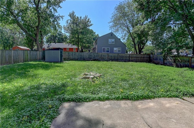 1700 S Pearl St, Independence, MO 64055 - fenced backyard with a shed