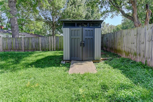 1700 S Pearl St, Independence, MO 64055 - view of shed with a fenced backyard