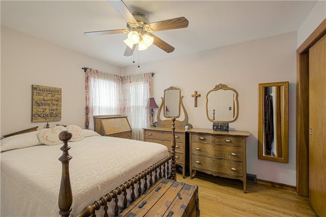 328 E 4th St, Lawson, MO 64062 - bedroom with light wood-style flooring and a ceiling fan