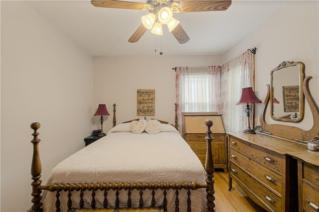 328 E 4th St, Lawson, MO 64062 - bedroom with light wood finished floors and a ceiling fan