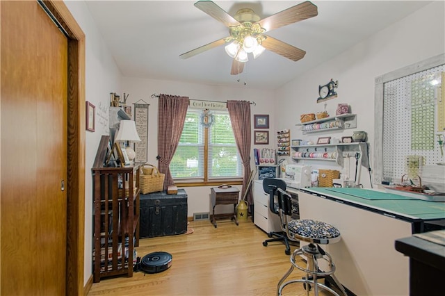 328 E 4th St, Lawson, MO 64062 - office area featuring light wood finished floors and a ceiling fan