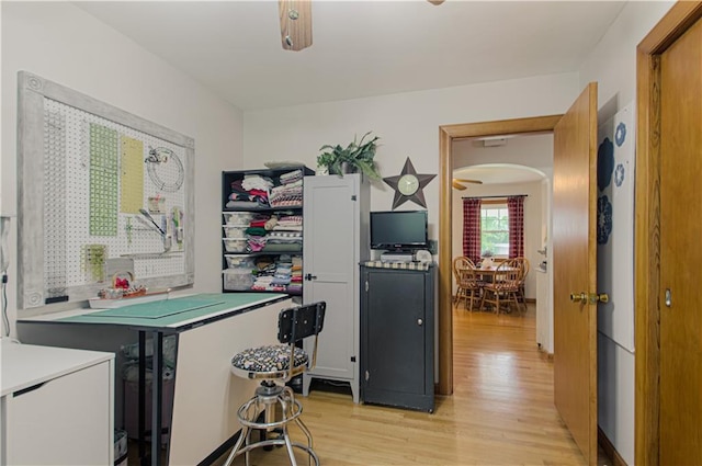 328 E 4th St, Lawson, MO 64062 - kitchen featuring light wood finished floors and arched walkways