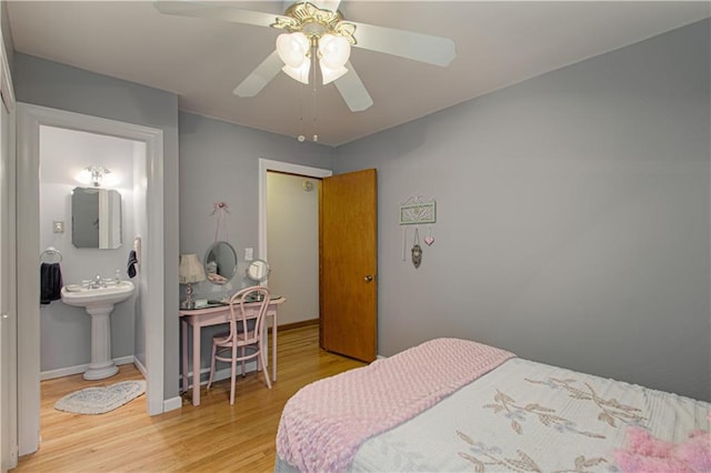 328 E 4th St, Lawson, MO 64062 - bedroom with light wood finished floors and a ceiling fan