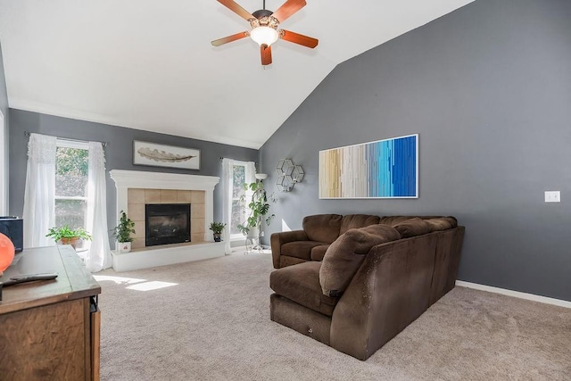 1311 Honeysuckle Ct, Liberty, MO 64068 - carpeted living area with ceiling fan, lofted ceiling, and a tile fireplace