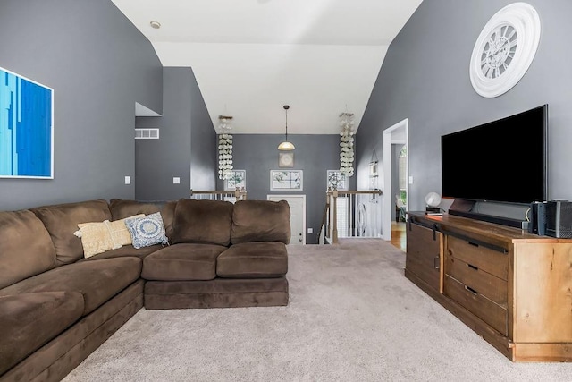 1311 Honeysuckle Ct, Liberty, MO 64068 - carpeted living area featuring high vaulted ceiling
