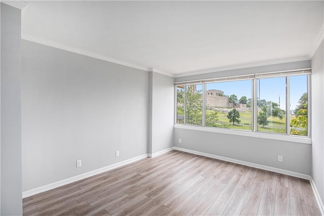 2525 Main St Unit 305, Kansas City, MO 64108 - empty room featuring ornamental molding and wood finished floors