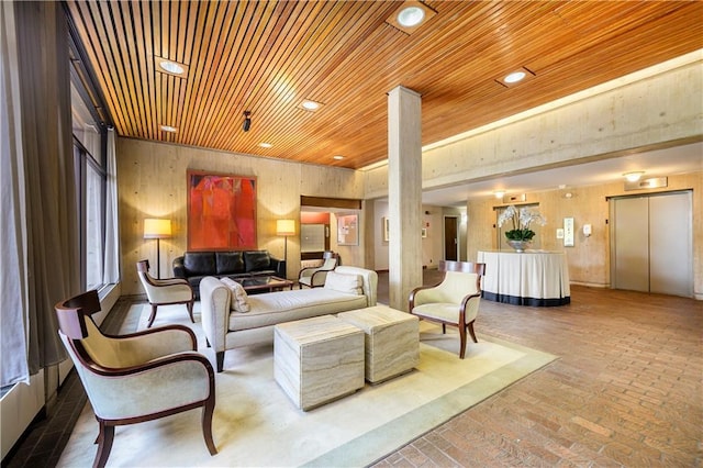 2525 Main St Unit 305, Kansas City, MO 64108 - building lobby with wooden ceiling, recessed lighting, and wooden walls
