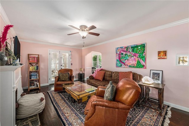 5147 Maple Ave, Mission, KS 66202 - living area with crown molding, wood finished floors, a ceiling fan, arched walkways, and french doors