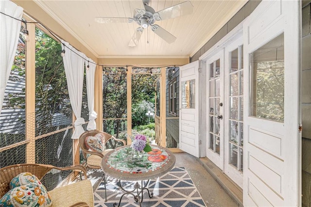 5147 Maple Ave, Mission, KS 66202 - sunroom / solarium with french doors, crown molding, a ceiling fan, and plenty of natural light