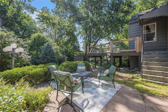 5147 Maple Ave, Mission, KS 66202 - view of patio with a deck and stairs