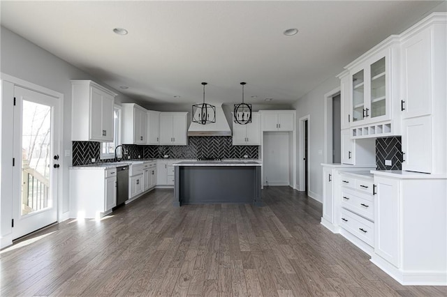 9015 N Colorado Ave, Kansas City, MO 64156 - kitchen featuring stainless steel dishwasher, plenty of natural light, tasteful backsplash, and recessed lighting