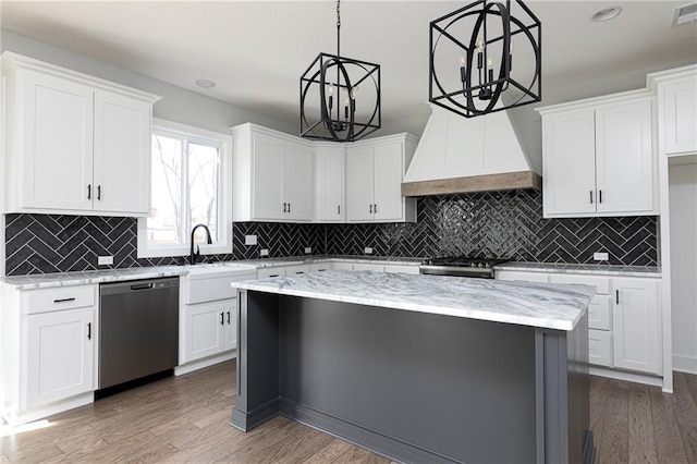 9015 N Colorado Ave, Kansas City, MO 64156 - kitchen featuring stainless steel dishwasher, white cabinetry, backsplash, light stone countertops, and recessed lighting