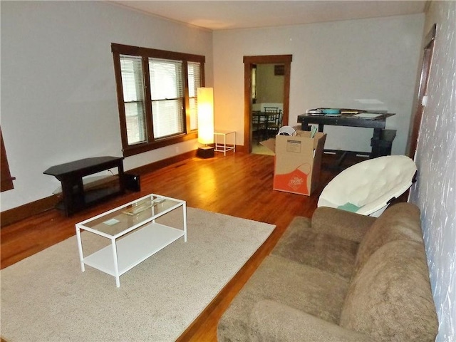 1909 S Broadway St, Pittsburg, KS 66762 - living room featuring wood finished floors