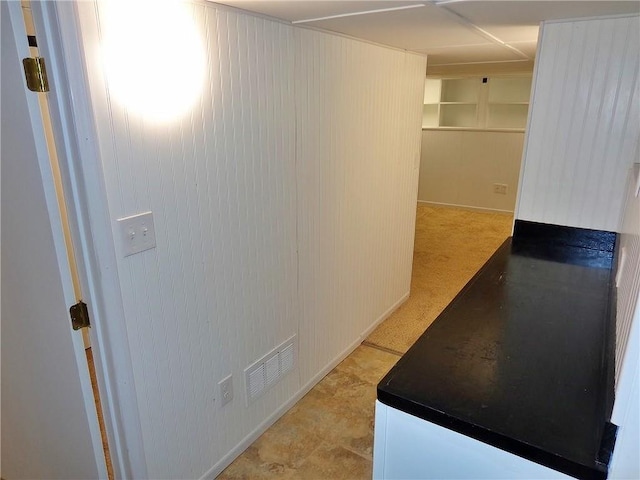 1909 S Broadway St, Pittsburg, KS 66762 - hall with wooden walls and baseboards