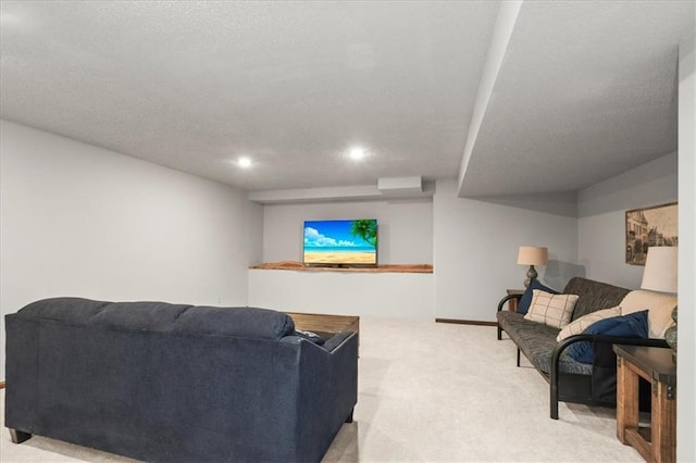601 Darrow St, Warrensburg, MO 64093 - carpeted living area with recessed lighting and a textured ceiling