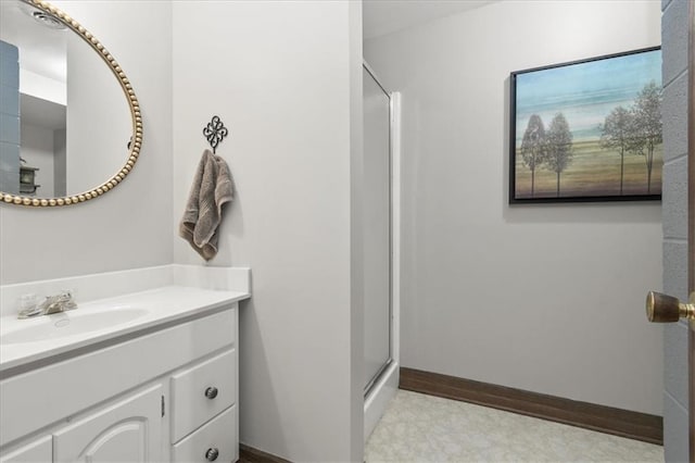 601 Darrow St, Warrensburg, MO 64093 - bathroom featuring vanity, a shower with shower door, and tile patterned floors