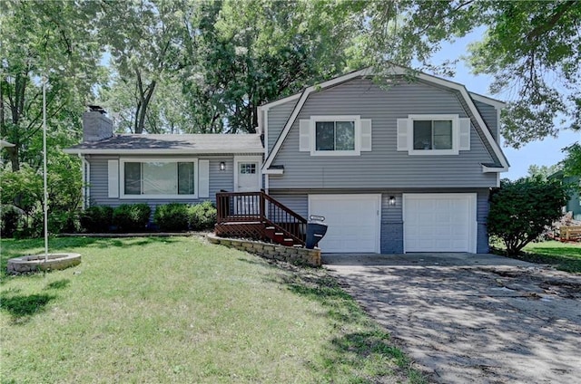 12825 E 50th Ter S, Independence, MO 64055 - view of front of property featuring an attached garage, asphalt driveway, a front yard, a gambrel roof, and a chimney