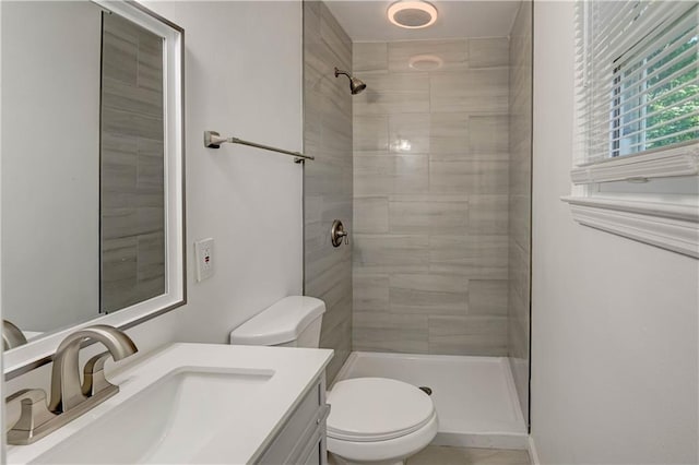 12825 E 50th Ter S, Independence, MO 64055 - bathroom featuring vanity and a tile shower