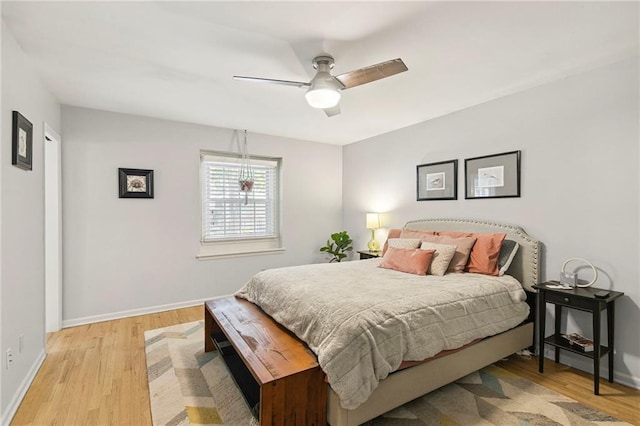 9934 Ballentine Dr, Overland Park, KS 66214 - bedroom with light wood-style flooring and a ceiling fan