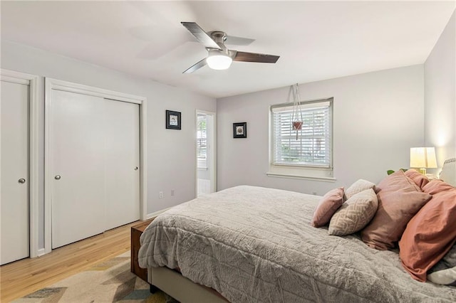 9934 Ballentine Dr, Overland Park, KS 66214 - bedroom featuring light wood finished floors and a ceiling fan