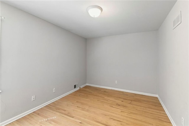 9934 Ballentine Dr, Overland Park, KS 66214 - unfurnished room featuring light wood-style floors and baseboards