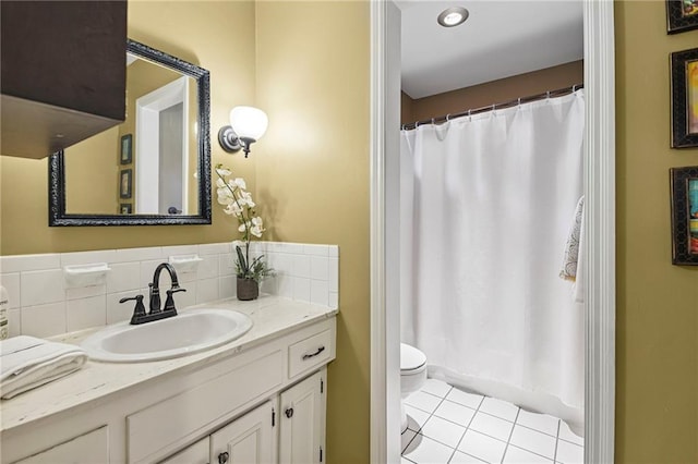 9934 Ballentine Dr, Overland Park, KS 66214 - full bathroom with tile patterned flooring and vanity