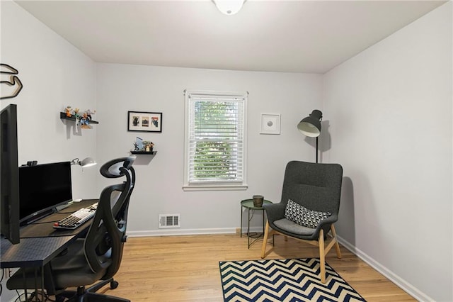 9934 Ballentine Dr, Overland Park, KS 66214 - office area with light wood-type flooring and baseboards