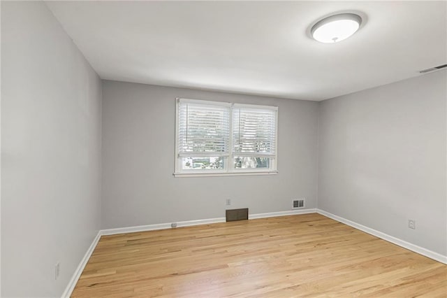 9934 Ballentine Dr, Overland Park, KS 66214 - spare room with light wood-style floors and baseboards