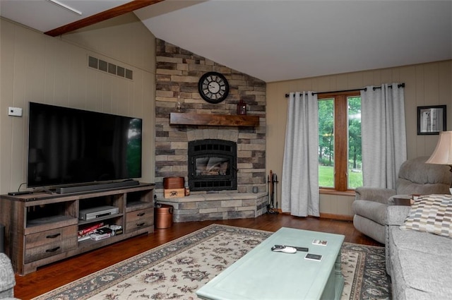 8231 Mike O Vince Rd, Ozawkie, KS 66070 - living area featuring lofted ceiling, wood finished floors, a fireplace, and wooden walls
