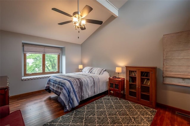 8231 Mike O Vince Rd, Ozawkie, KS 66070 - bedroom with wood finished floors, high vaulted ceiling, ceiling fan, and beam ceiling