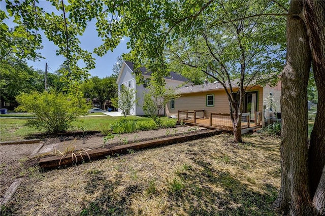 1504 Oak Hill Ave, Lawrence, KS 66044 - view of yard featuring a wooden deck