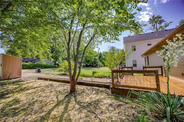 1504 Oak Hill Ave, Lawrence, KS 66044 - view of yard with a wooden deck