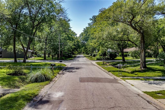 1504 Oak Hill Ave, Lawrence, KS 66044 - view of asphalt street with street lighting and curbs