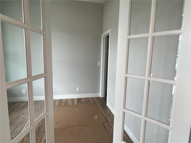 1709 SW Arbor Park Dr, Lees Summit, MO 64082 - hall featuring dark wood-style floors and baseboards