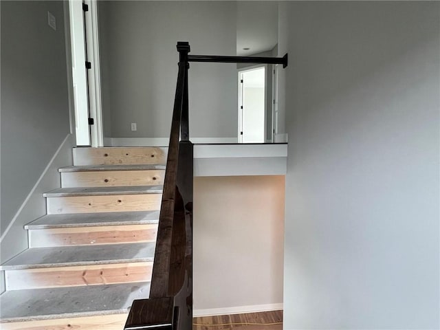1709 SW Arbor Park Dr, Lees Summit, MO 64082 - staircase with baseboards and wood finished floors