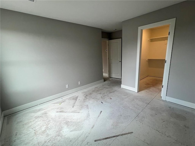 1709 SW Arbor Park Dr, Lees Summit, MO 64082 - unfurnished bedroom with unfinished concrete floors and a spacious closet