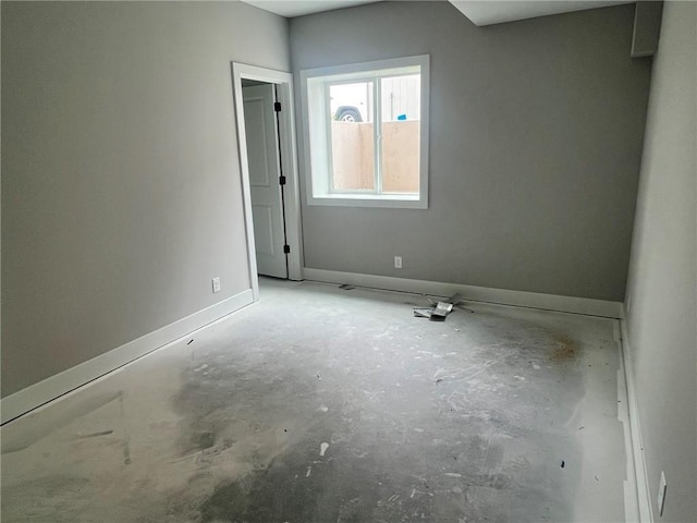 1709 SW Arbor Park Dr, Lees Summit, MO 64082 - empty room featuring baseboards and unfinished concrete flooring